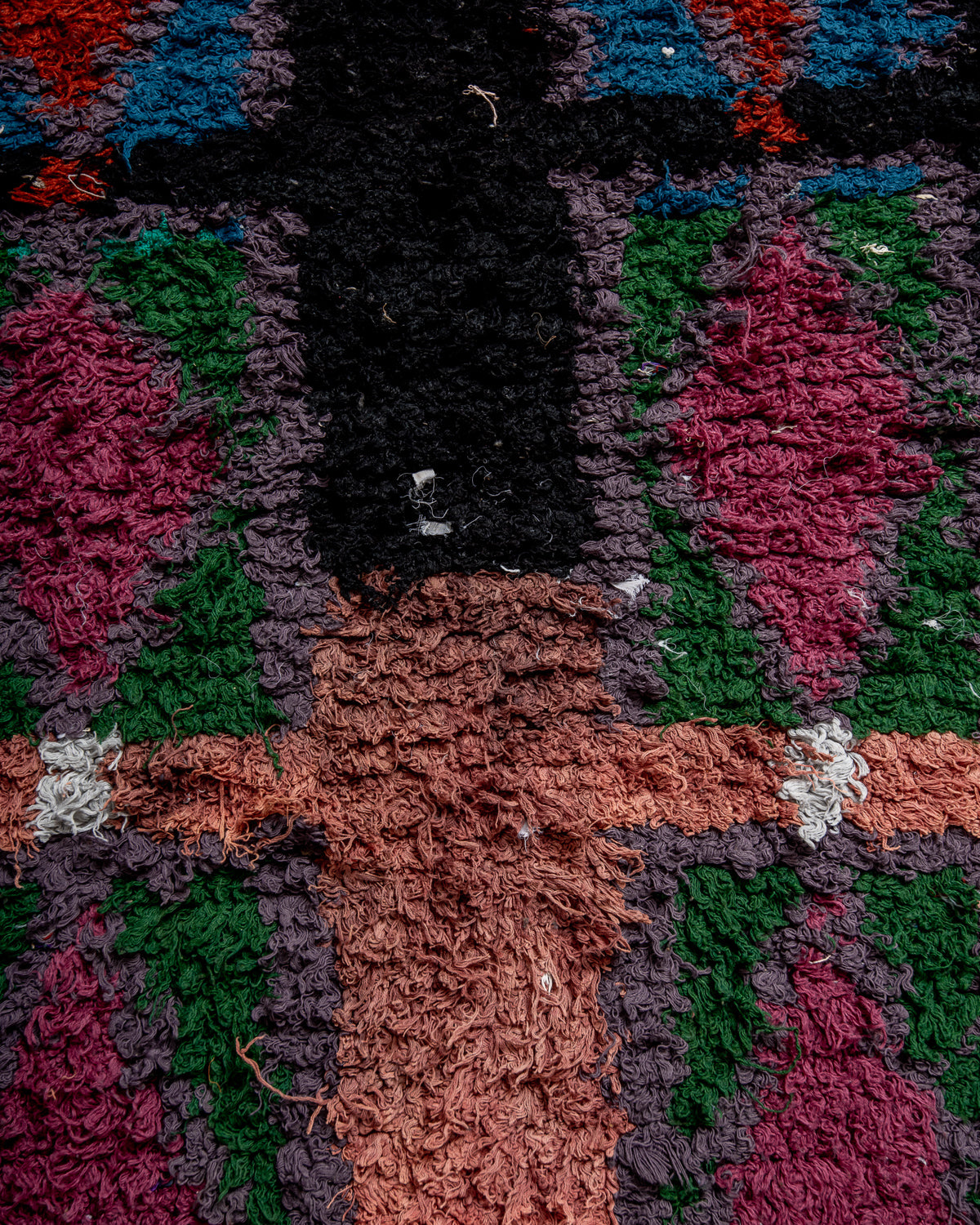 Modern designer vintage handcrafted Berber rug from Morocco. Boucherouite with beautiful colors and patterns.
